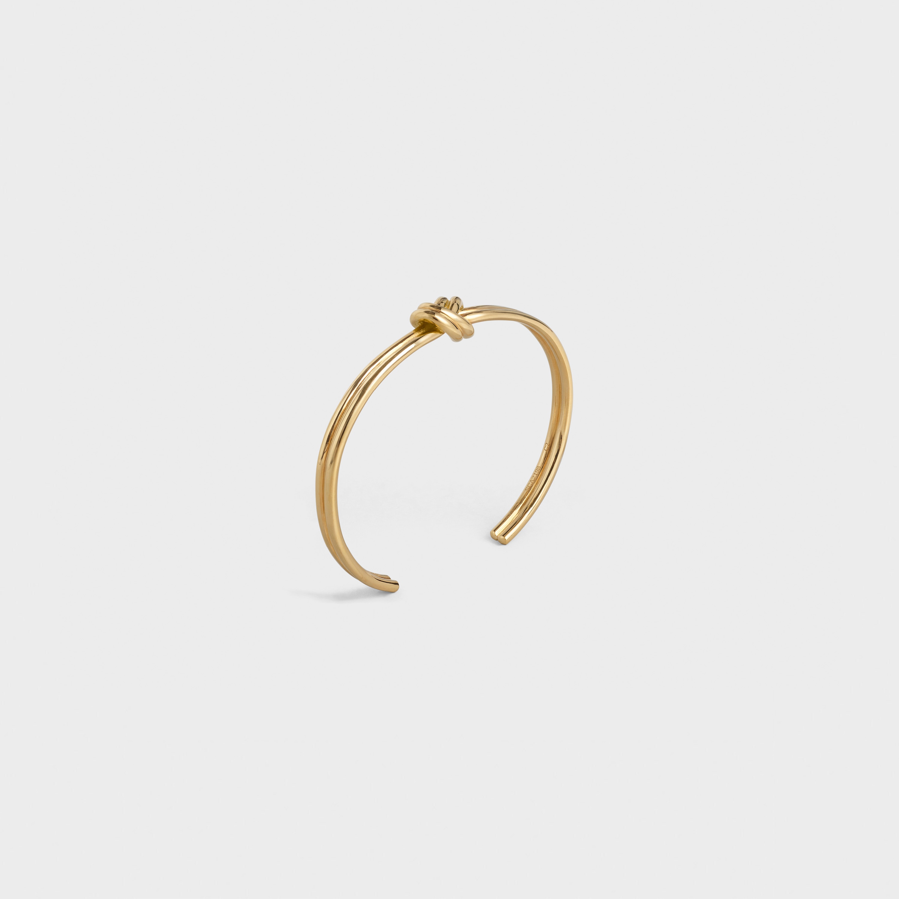 Celine knot double bracelet in brass with gold finish Clearance