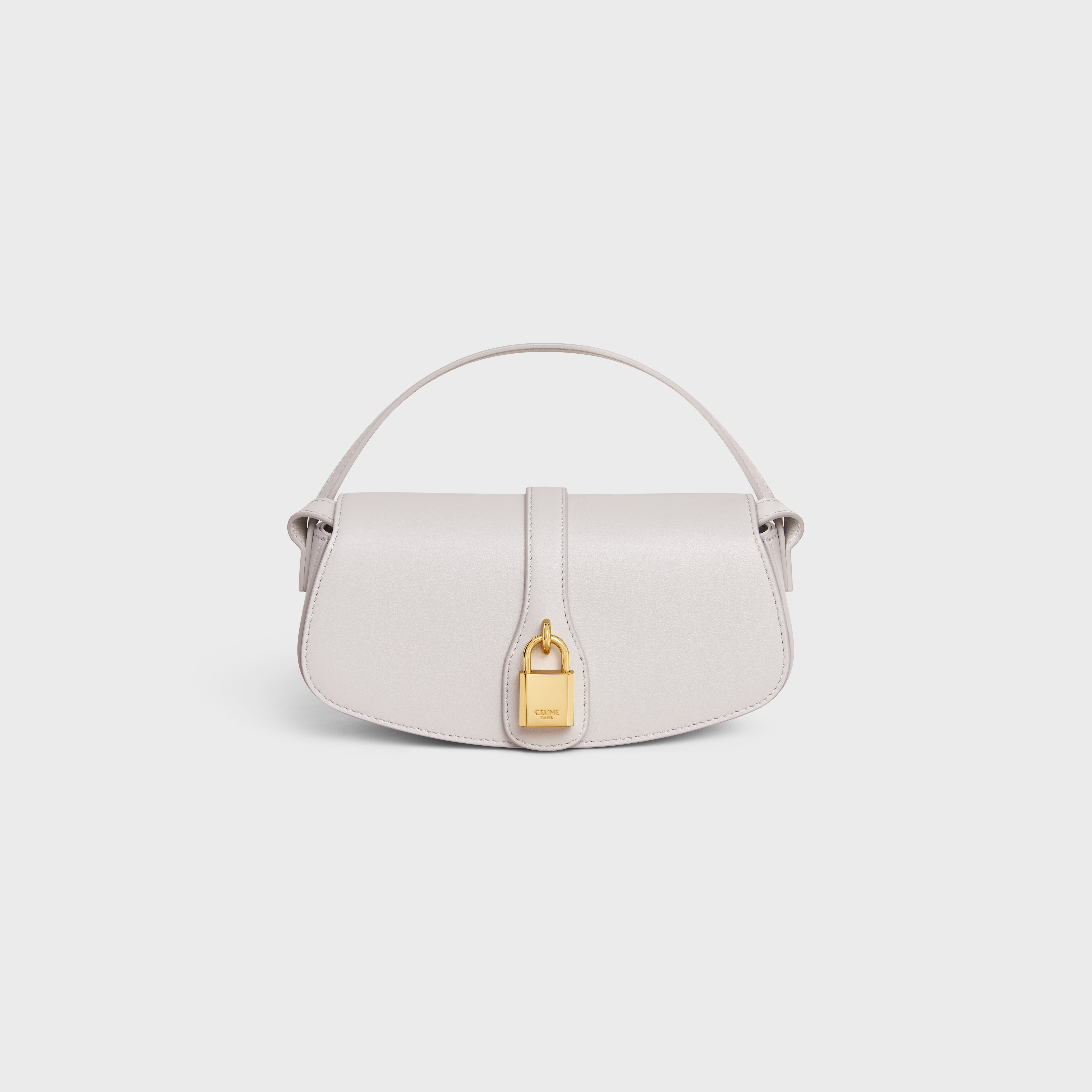 CLUTCH ON STRAP TABOU IN SMOOTH CALFSKIN - TAN