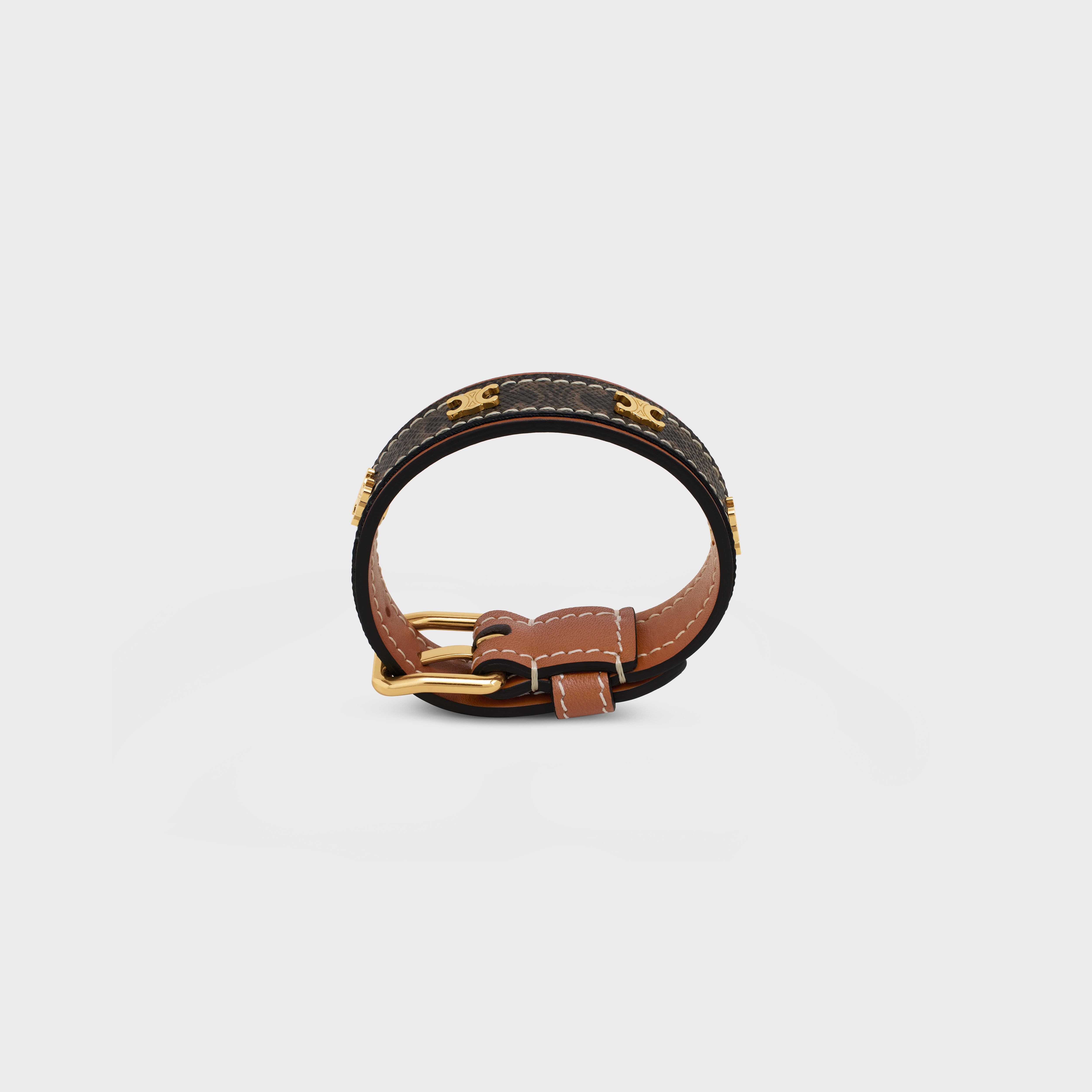 TRIOMPHE LEATHER BRACELET IN BRASS WITH GOLD FINISH AND CALFSKIN