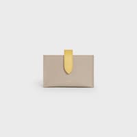 Tarjetero estilo acordeón de piel de becerro con textura granulada bicolor - Nude / limón - 390 RUE SAINT-HONORE - 1 | CELINE